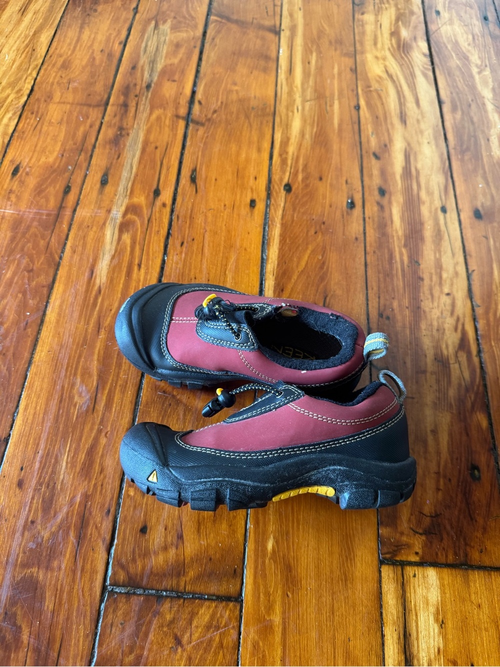 Keen Kids Slip-On Sneakers in Burgundy and Black with Yellow Accents